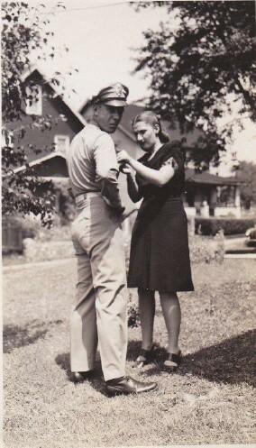 John's wife pins on his wings